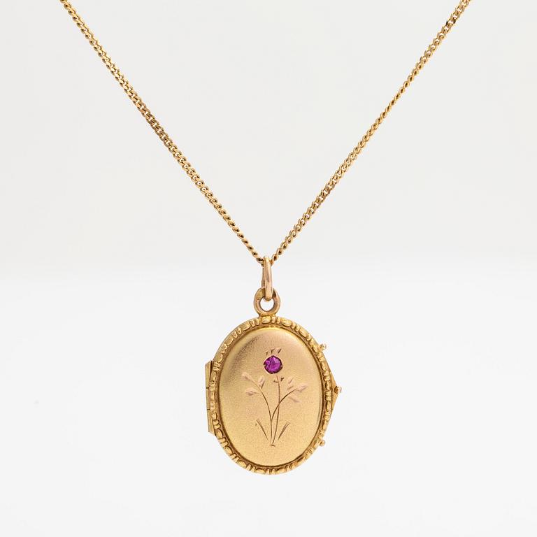 A 14K gold necklace with a locket and a syntetic ruby. Soviet Union.