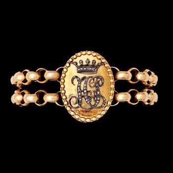 116. A gold bracelet, 1908.