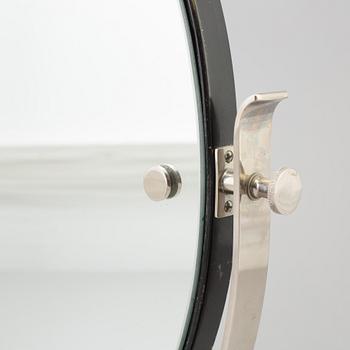 A 1930s art déco table mirror.