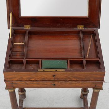 A French Empire mahogany sewing table, first part 19th century.