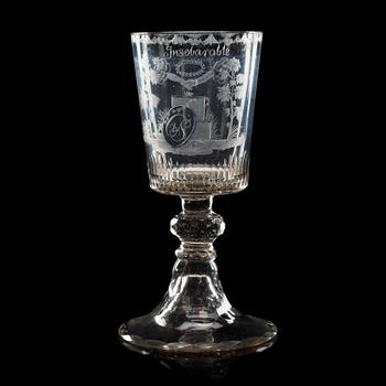 628. An engraved wine goblet, England, early 19th Century.
