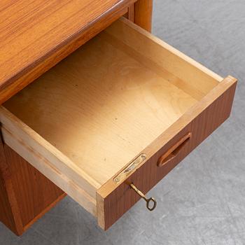 A 1950/60's oak and teak writing desk.