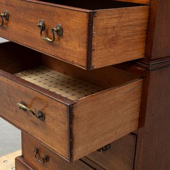 A mahogany 'Tallboy' chest of drawers.