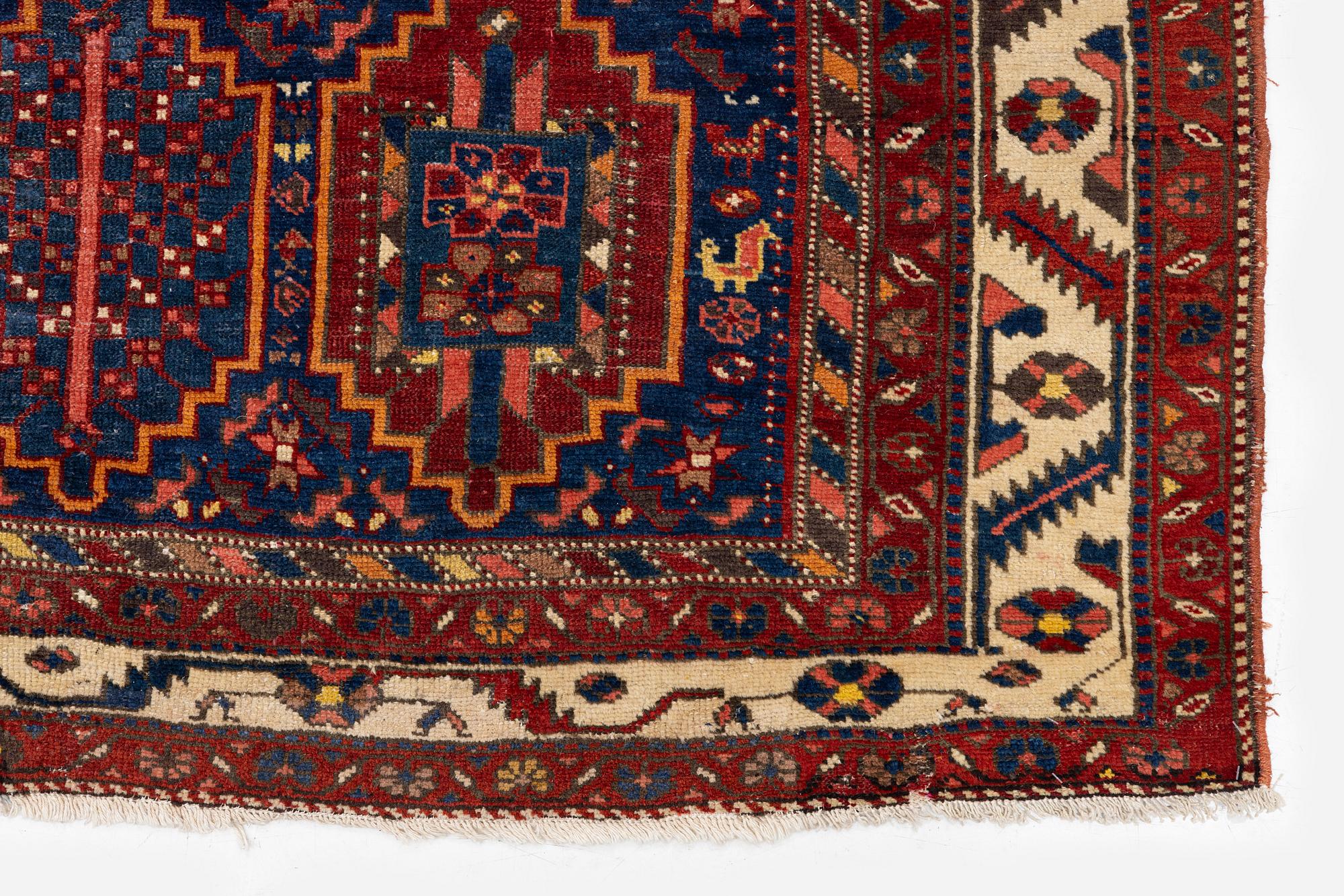 A semi-antique Baba Haydar carpet, Chahar Mahal and Bakhtiari region, West Persia, c. 297 x 156 cm.