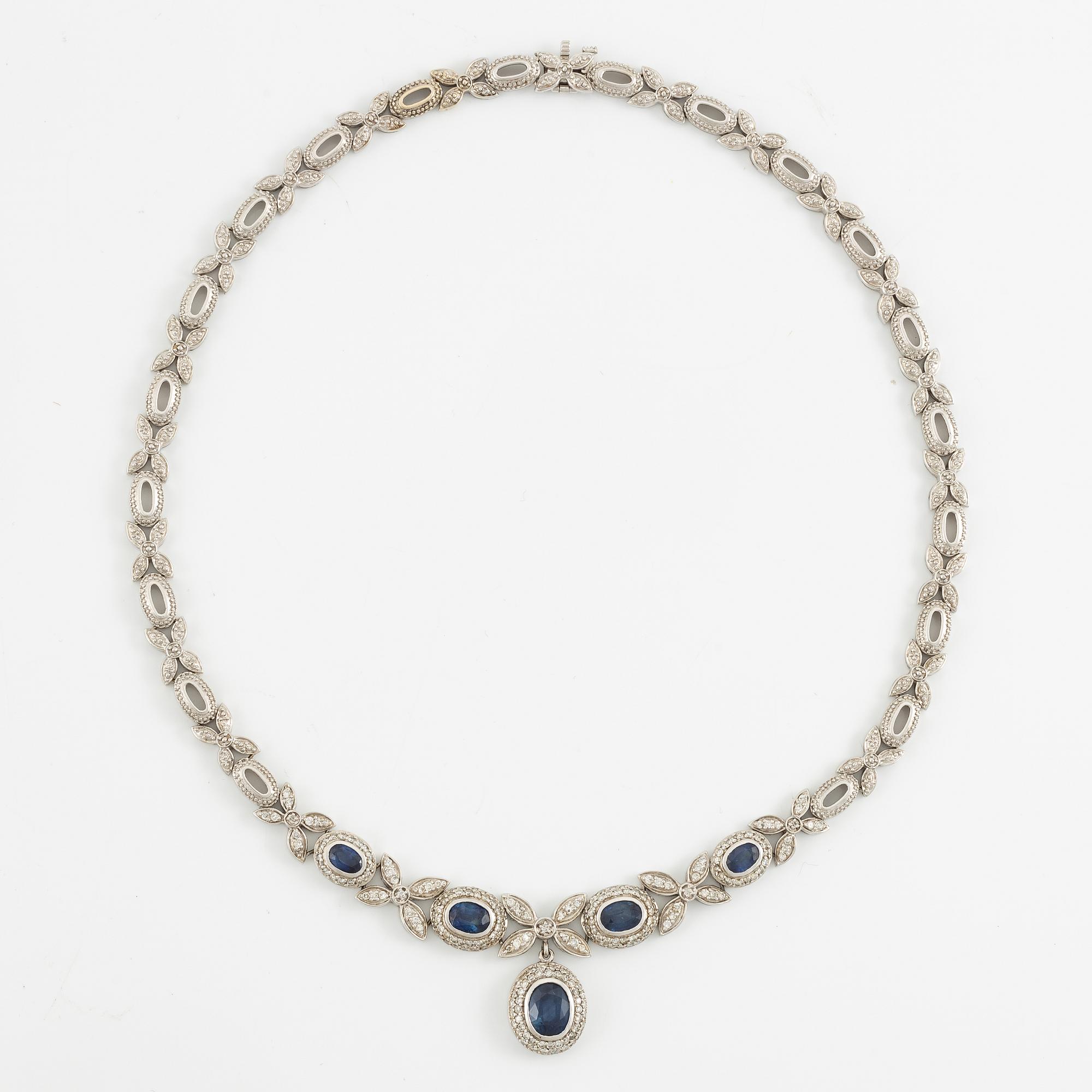 Necklace 18K white gold with sapphires and brilliant-cut diamonds.