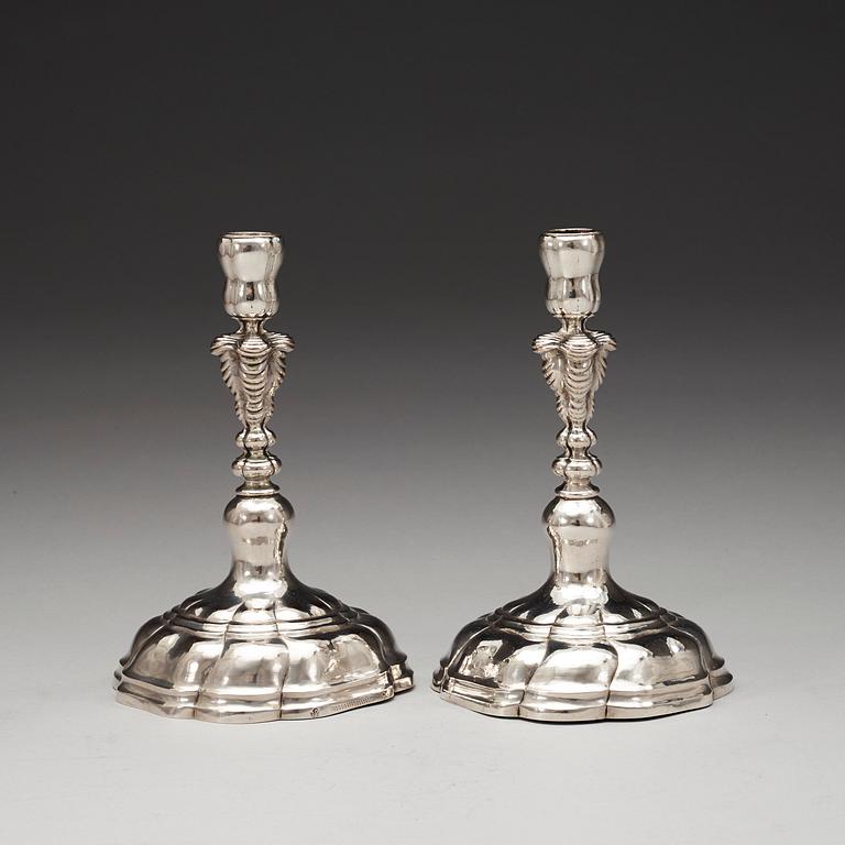 A pair of German mid 18th century silver candlesticks, possibly of Carl David Schröder, Dresden 1750-1775.