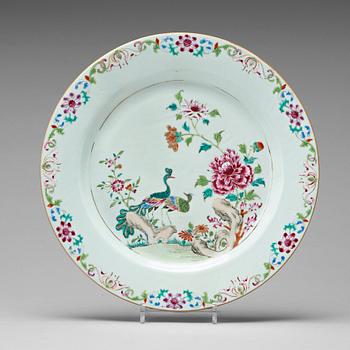 708. A famille rose 'double peacock' dish, Qing dynasty, Qianlong (1736-95).