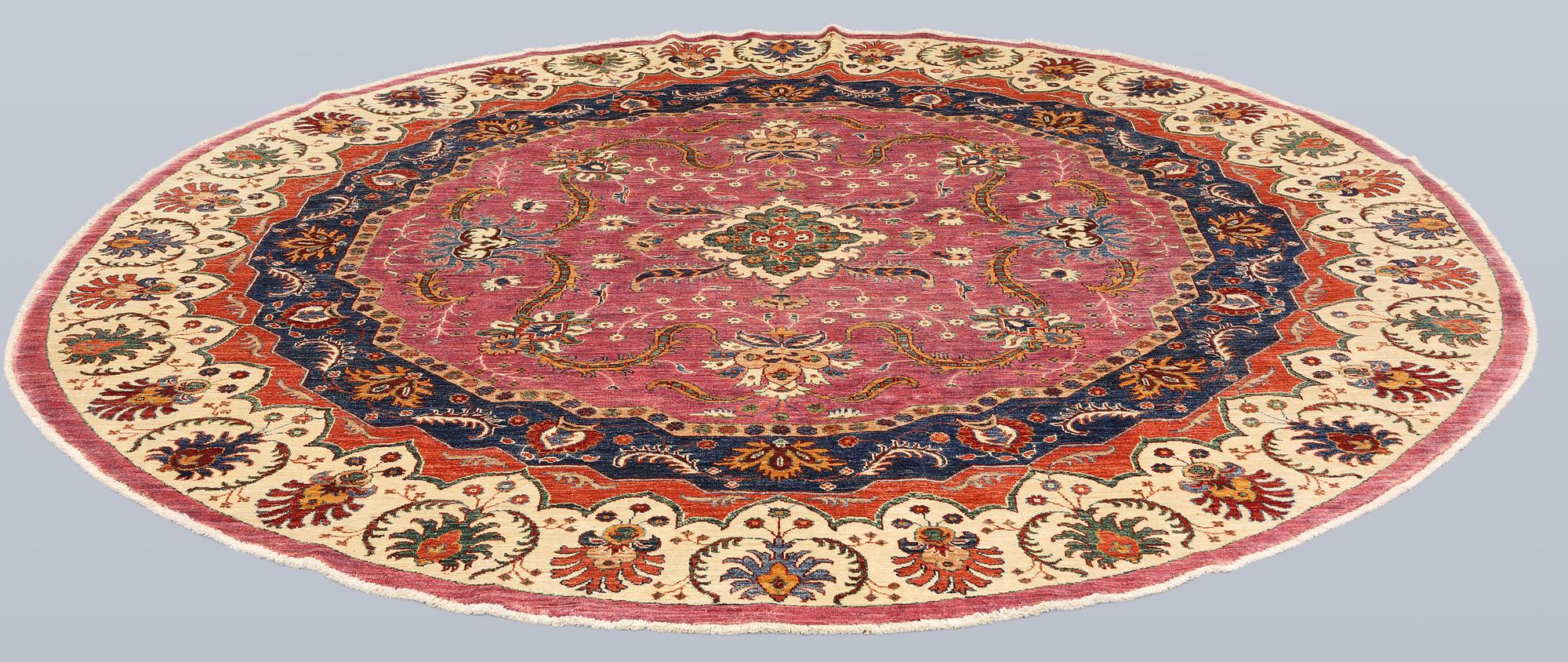 A rug, Ziegler design, diameter approx. 244 cm.