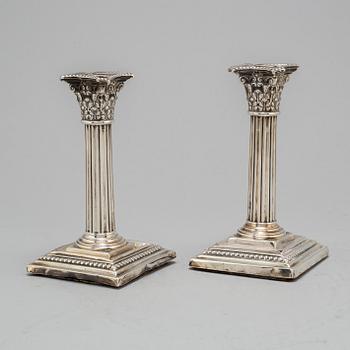 A pair of silver candle holders, Thomas Bradbury III & John S Henderson, London, 1881, 504 gram.