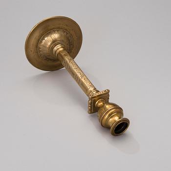 A brass candlestick from Flanders / Germany of the turn of the 17th century.