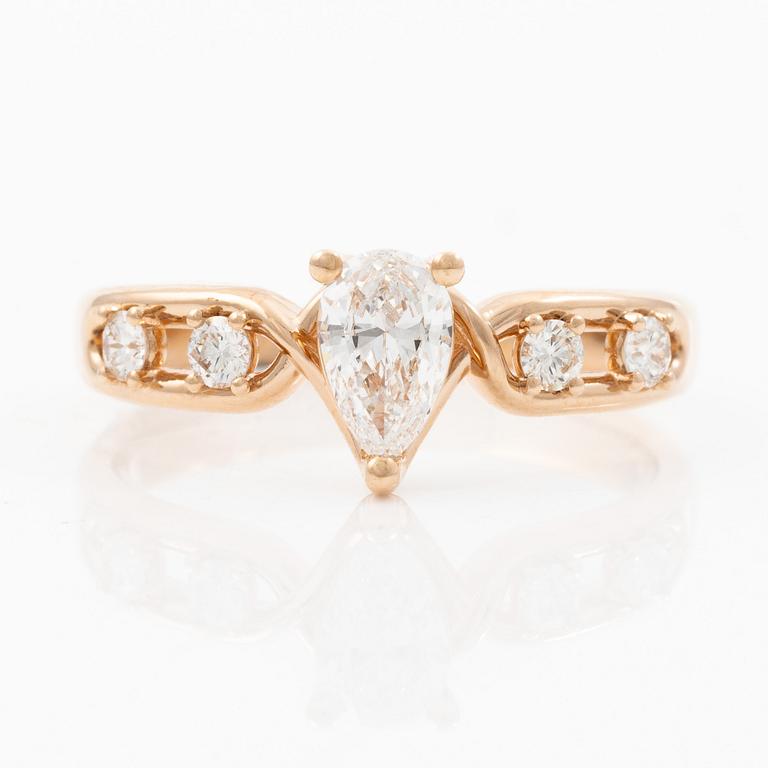 Ring 14K rose gold with a pear-shaped diamond and brilliant-cut diamonds, accompanied by an IGI report.