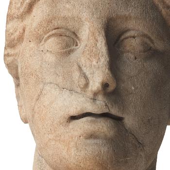 A marble head of a woman, probably Roman 100-200 AD.