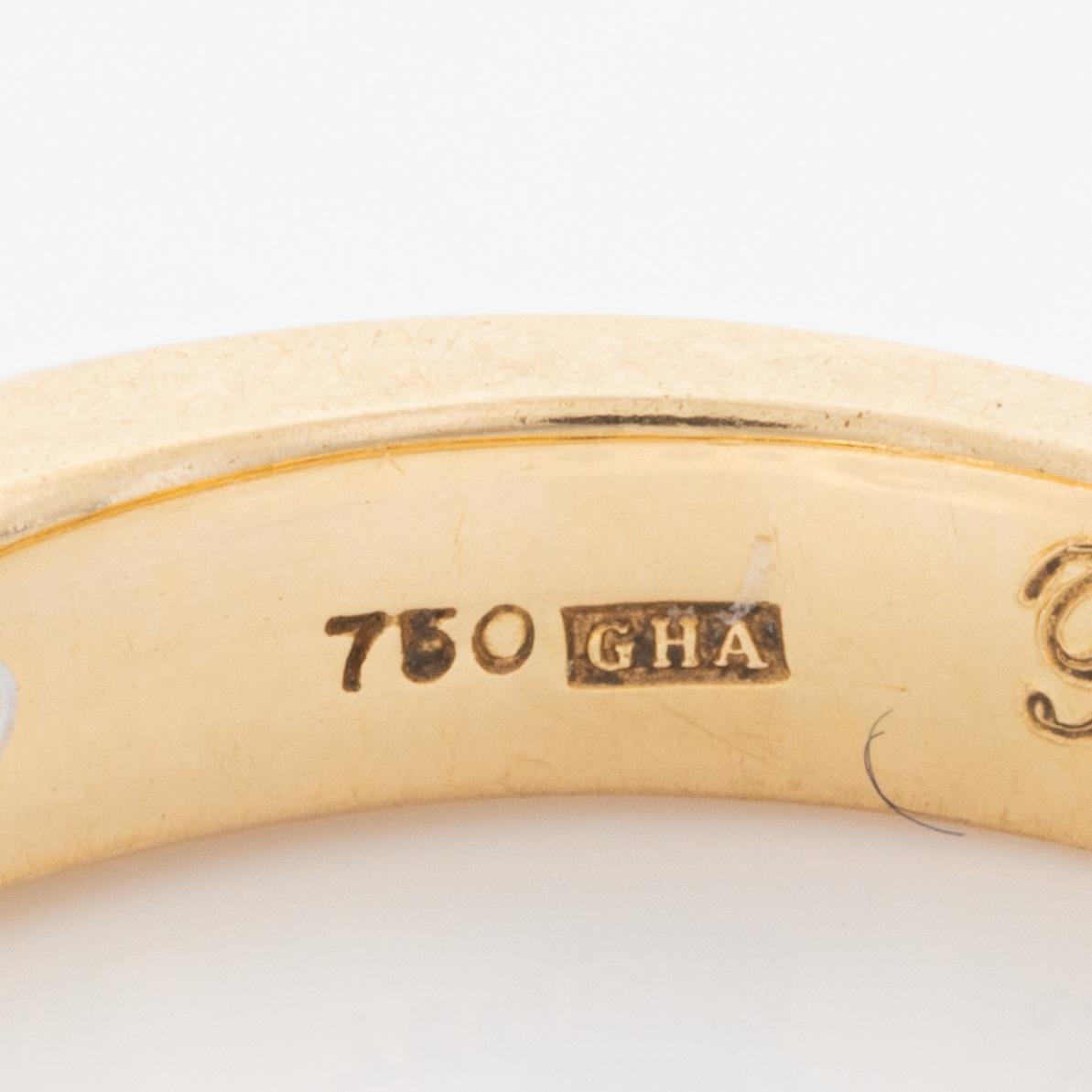 Ring 18K guld med runda briljantslipade diamanter.