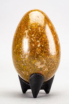 A faience sculpture of an egg by Hans Hedberg, Biot, France.