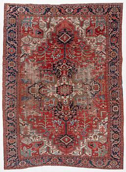 An Antique Heriz carpet, north west persia, c. 420 x 210 cm.