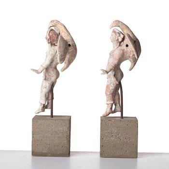 A pair of greek pottery figures of Zeus and Ganymede, Hellenistick period, circa 2nd Century B.C.