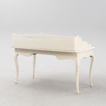 A painted rococo writing desk, mid 18th Century with later parts.