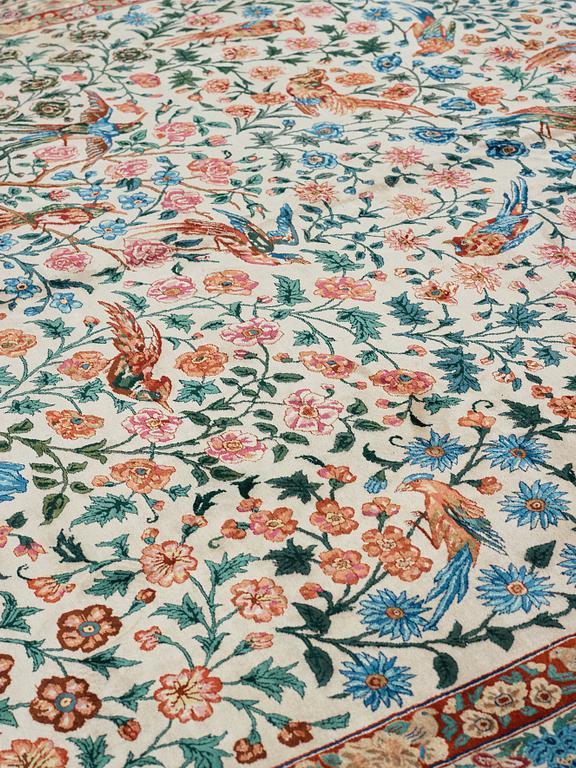 A CARPET, "Golo Bolbol" (="Flower and bird"-motive), a silk Esfahan figural, ca 337 x 243,5 cm, Mohammad Seirafian.