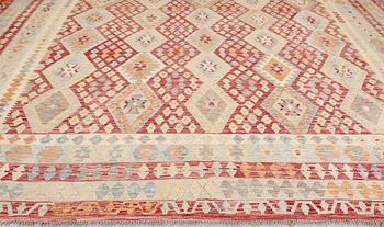 A Kilim carpet, approx. 433 x 369 cm.