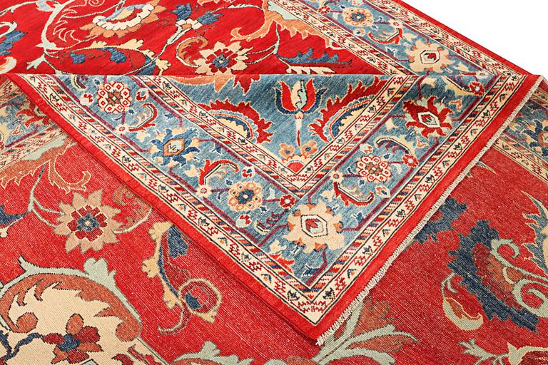 A Kazak carpet, c. 354 x 266 cm.