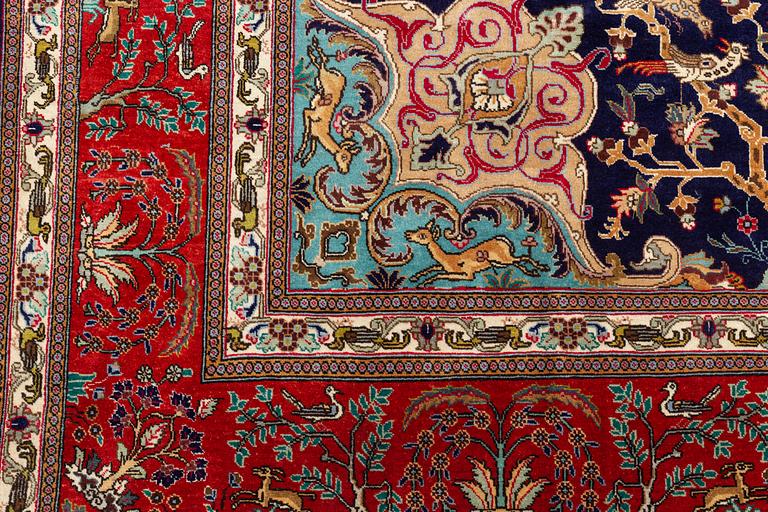 A carpet, Tabriz, signed Ipchilar, ca 385 x 280 cm.