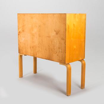 Alvar Aalto, mid-20th century '810' cabinet and a 
'69'chair Oy Huonekalu- ja Rakennustyötehdas Ab.