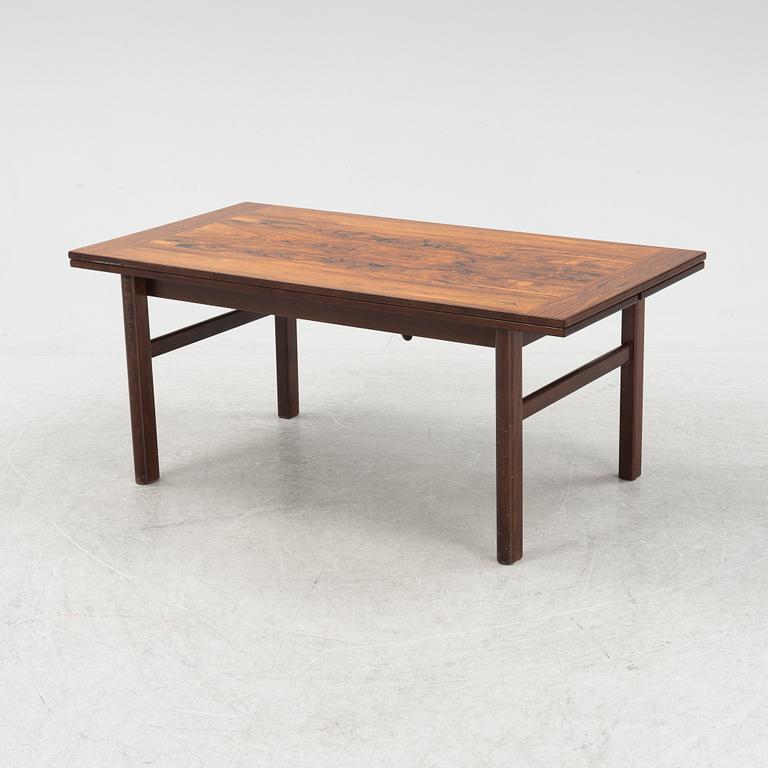 A convertable rosewood dining table/coffee table, 1960's/70's.