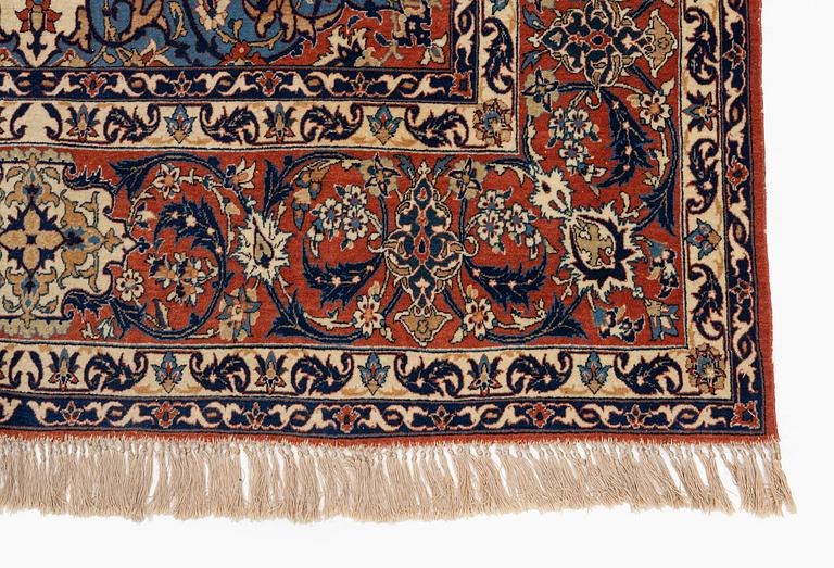 An antique/semi-antique Isfahan, rug c. 239 x 143 cm.