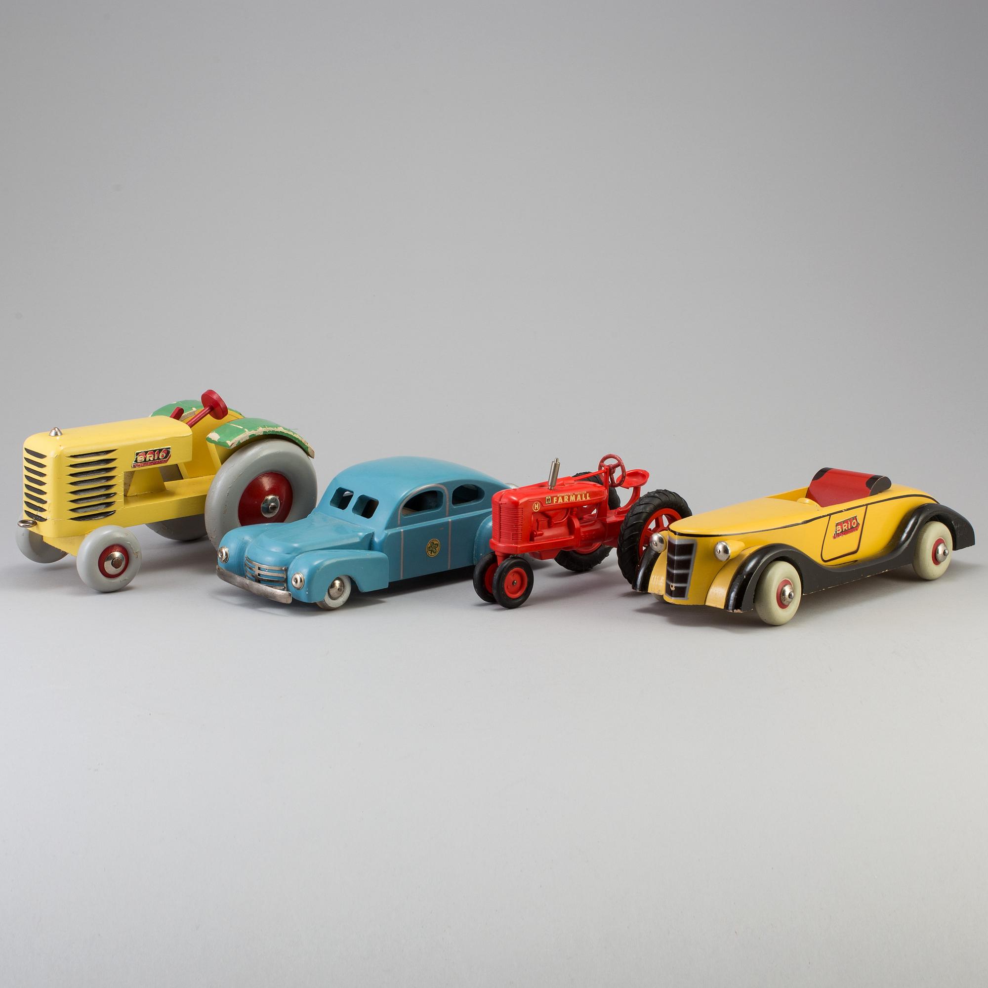 Four wood and plastic toys, Brio and Luck, Sweden, mid 20th century.