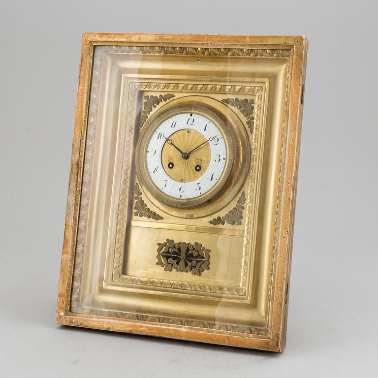 A clock, 19th Century.