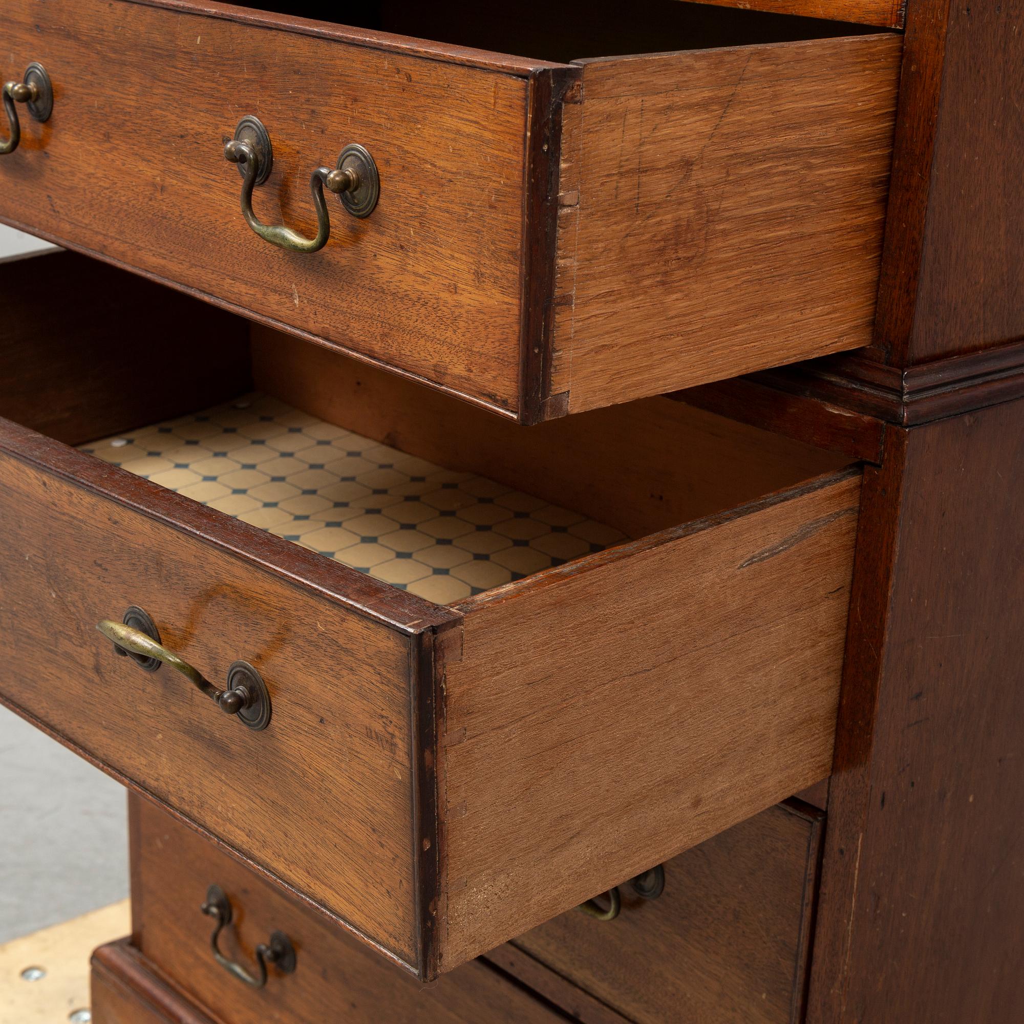 A mahogany 'Tallboy' chest of drawers.