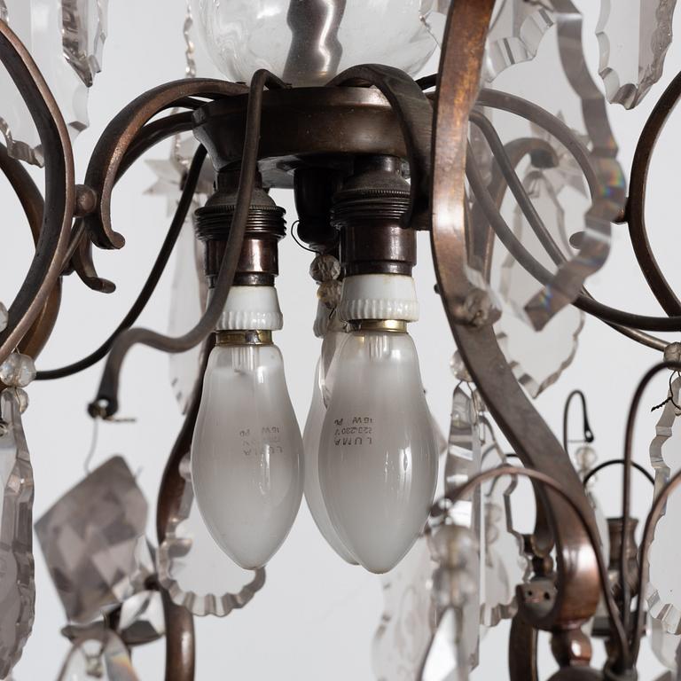 A Rococo style chandelier, early 20th century.