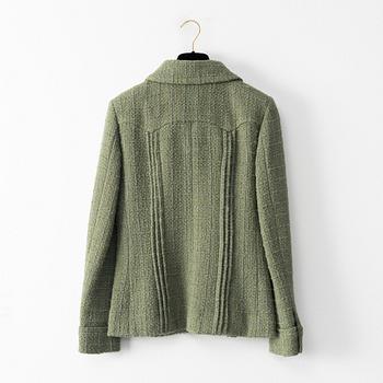 Chanel, A green bouclé jacket, french size 34.