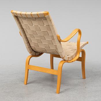 A beech Bruno Mathsson 'Eva' armchair from Dux.