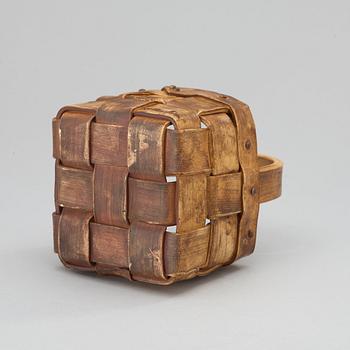 An Ingrid Herrlin stoneware blueberry basket with two lingonberries, Båstad, Sweden.