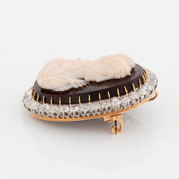 A hardstone cameo brooch with a frame of old cut-dimonds.