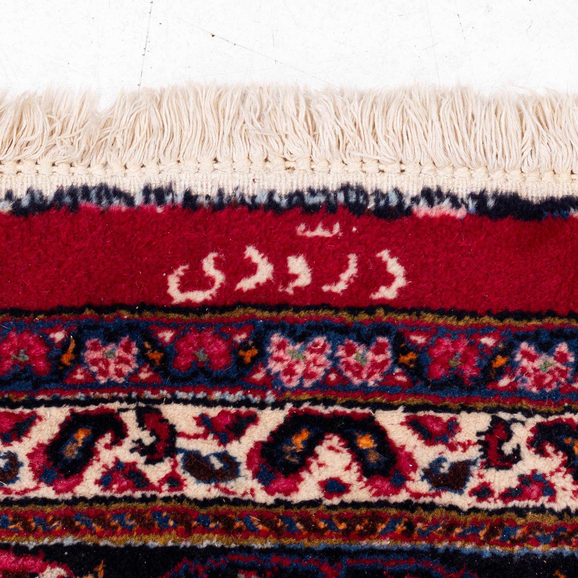 A Meshad carpet, ca 410 x 290 cm.