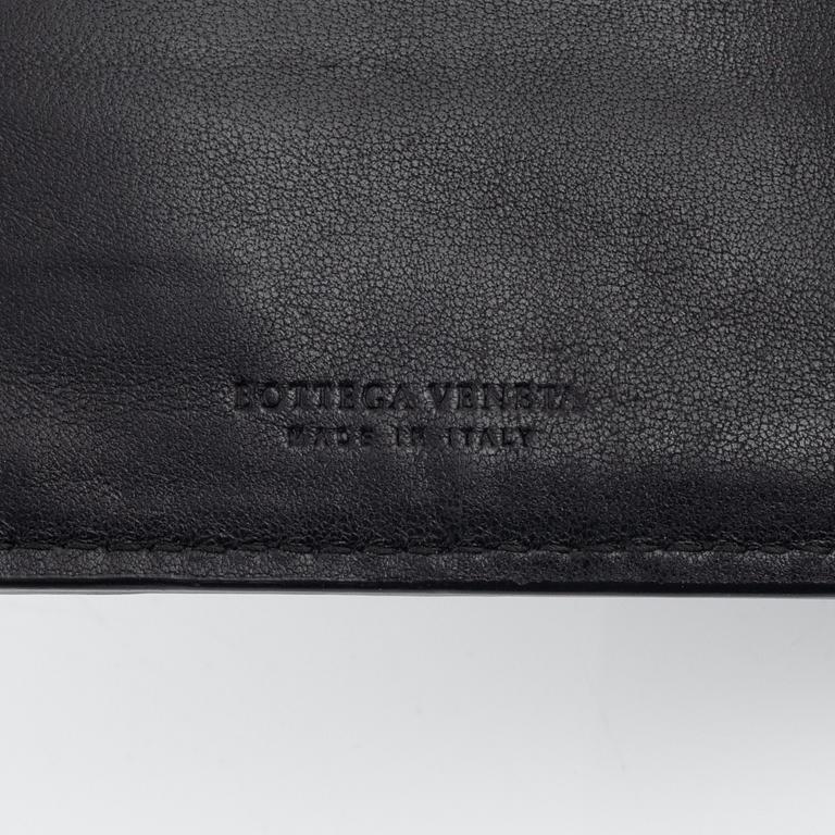 Bottega Veneta, a wallet and bracelet.
