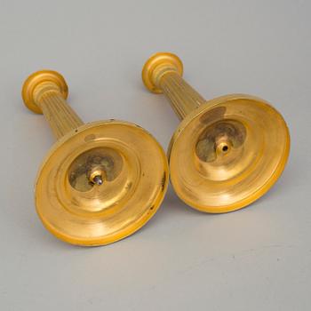 A PAIR OF EMPIRE CANDLESTICKS, first half of the 19th century.