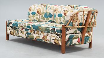 A Josef Frank mahogany and rattan daybed, Svenskt Tenn, model 2145.