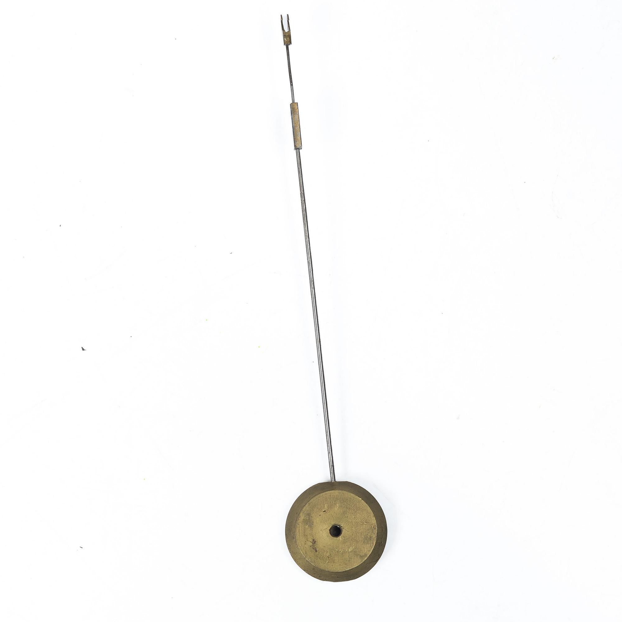 A French Charles X ormolu and patinated bronze mantel clock, ca 1820's.