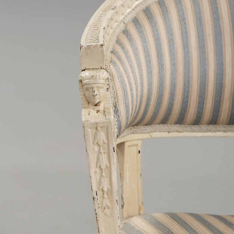 A pair of late Gustavian armchairs in the manner of Ephraim Ståhl, master in Stockholm 1794-1820.