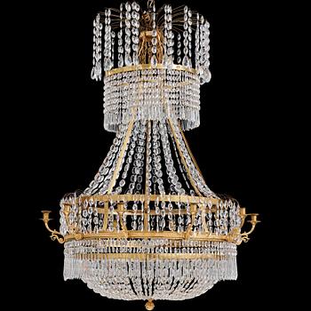 121. A Swedish Empire ten-light chandelier, early 19th century.