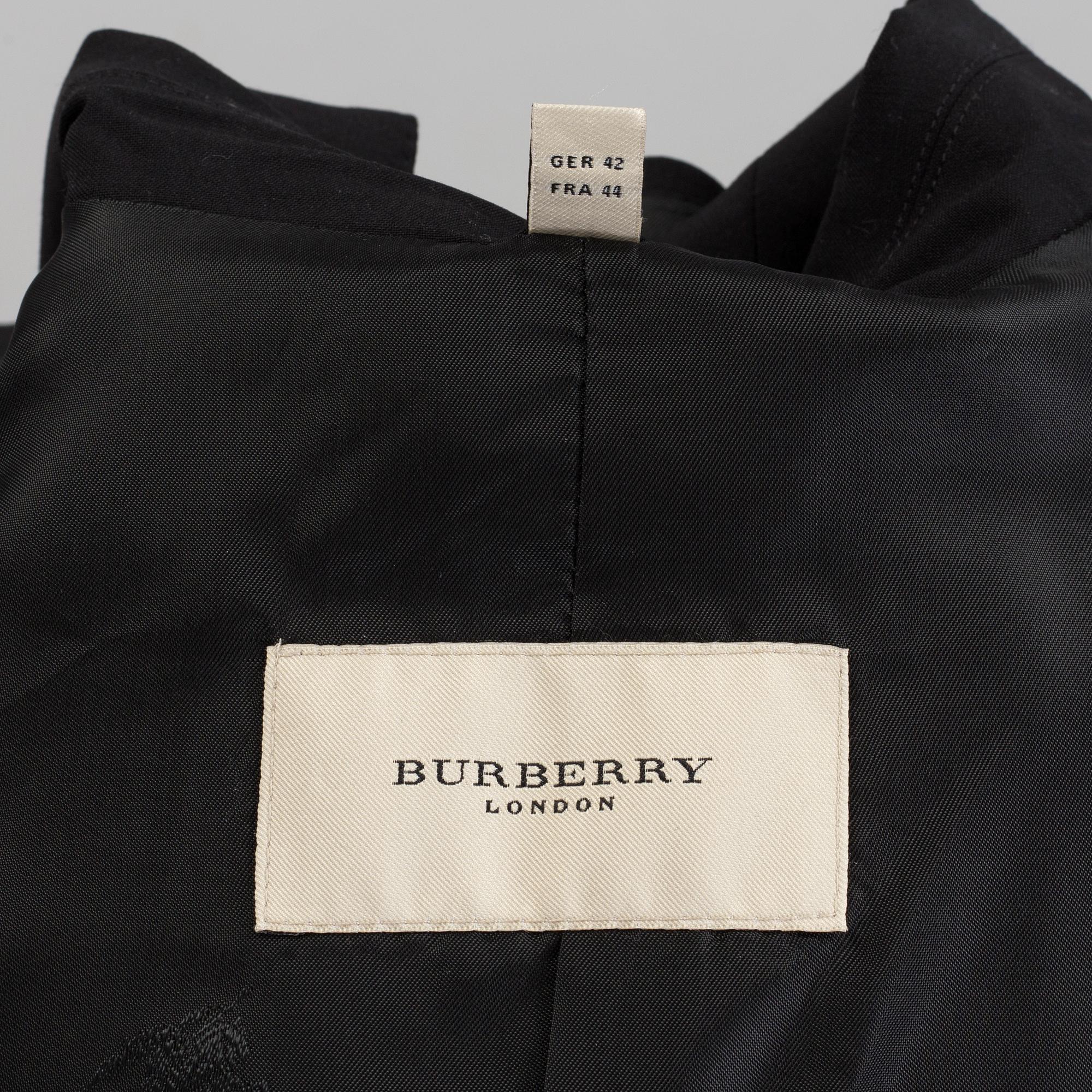 An Burberry suit, in size 42.