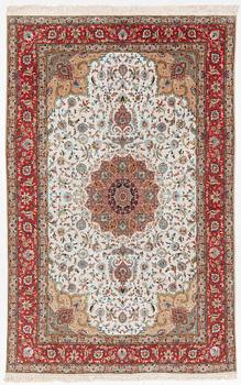 Rug, Tabriz, approx. 312 x 200 cm.