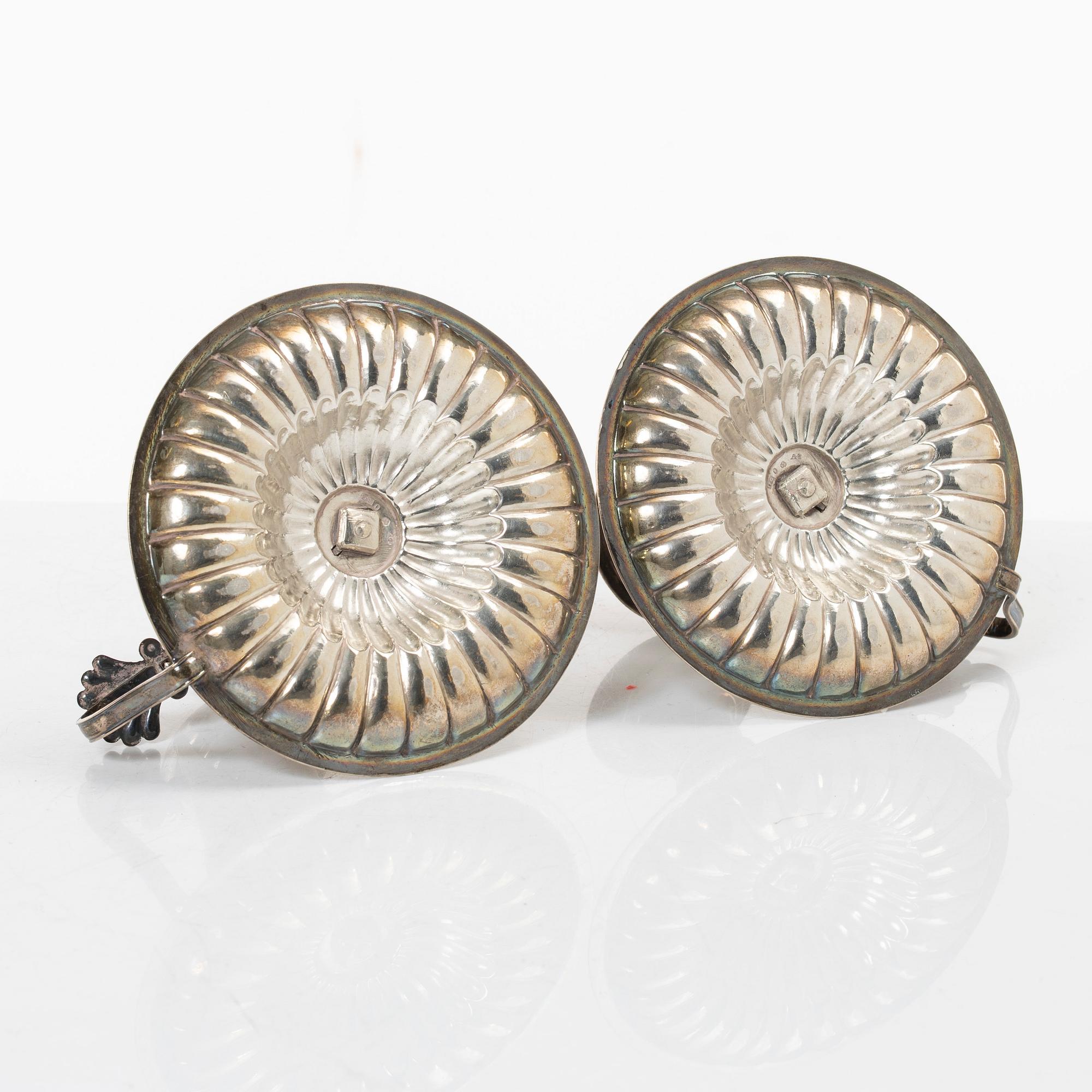 Johan Petter Grönvall, A pair of Swedish Empire silver chambersticks, mark of Johan Petter Grönvall, Stockholm 1831.