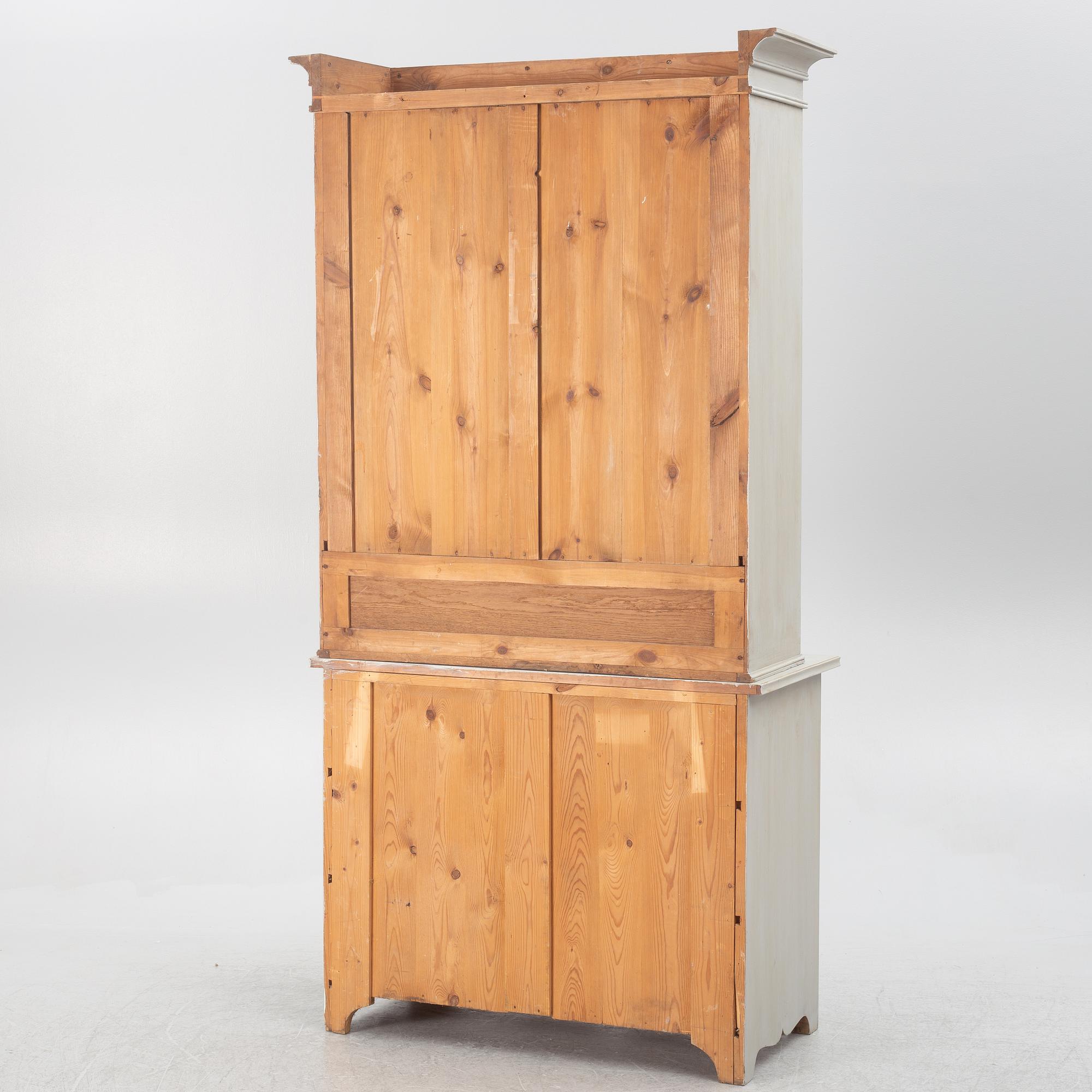 Display cabinet, early 20th century.