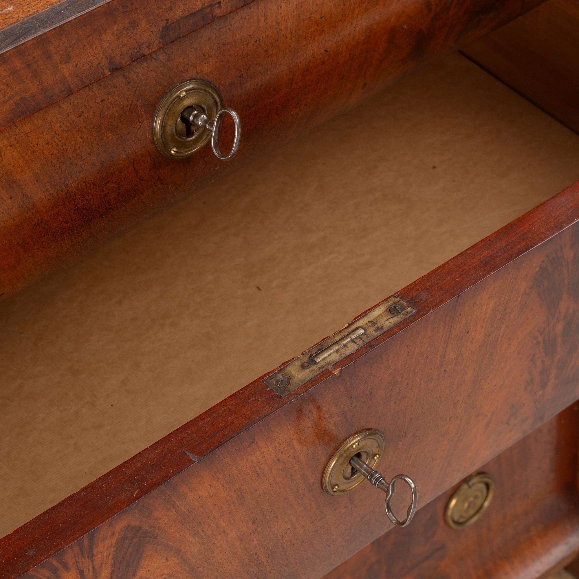 An Empire chest of drawers, first half of the/mid 19th century.