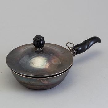 a silver deep dish by Nordiska kompaniet, Stockholm, 1929.