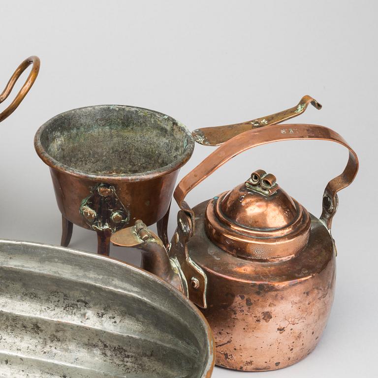 Six 19th century copper pots and pans.